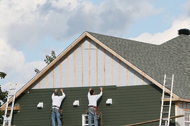 Professional Emergency Siding Repair technician working in London, OH